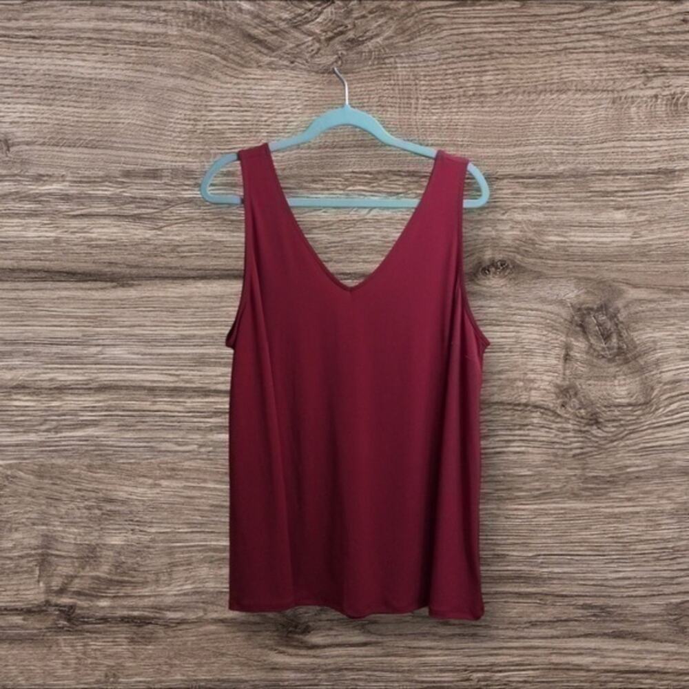 NWOT torrid 2 rust colored sleeveless flowy blouse. 2X